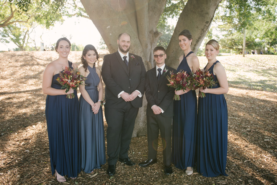 Bridal party under a tree