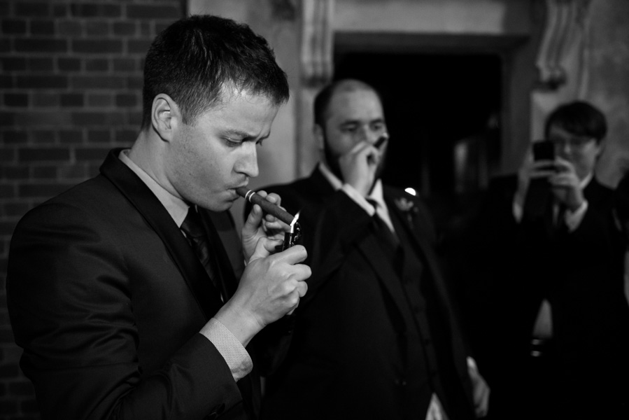 Boys of the party having a cigar